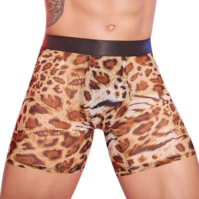 Men's leopard print nylon boxer shorts laid flat, showing the full animal pattern.