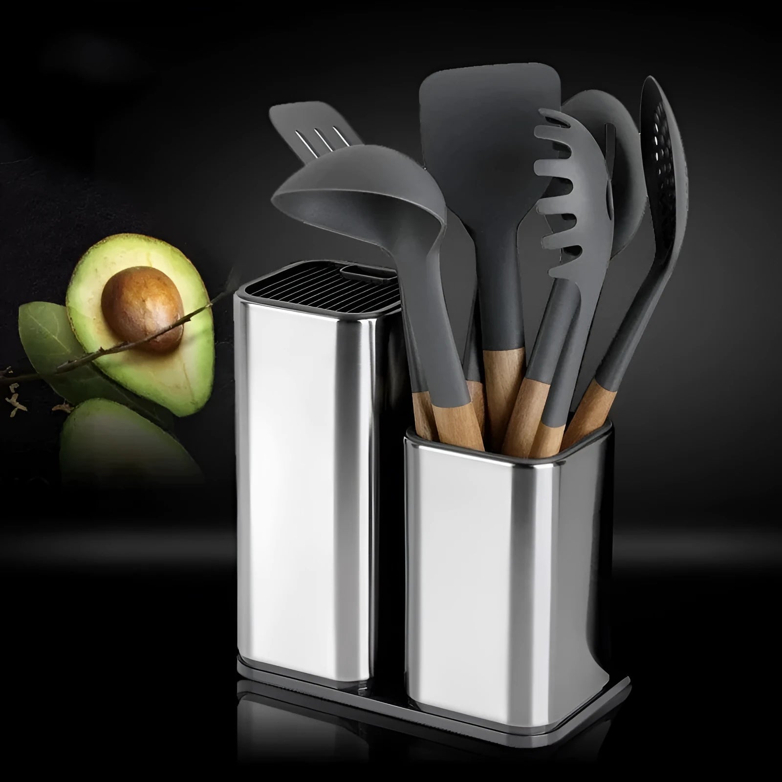Black stainless steel kitchen tool holder with detachable base next to knives and cutlery