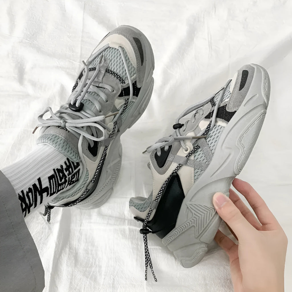 Men's white Korean style platform dad shoes with front lace-up and chunky sole on a plain background.