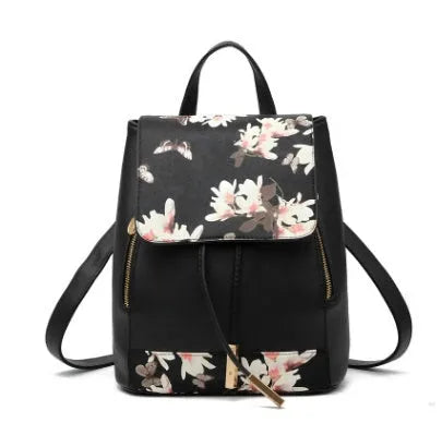 Women's large PU leather backpack in square vertical shape with tassel and magnetic buckle, shown in wine red.