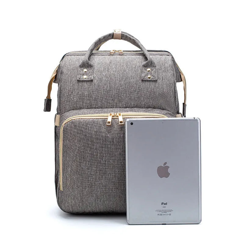 Folding baby bag bed backpack with portable mattress, USB charging option, front pocket, and multiple colour choices