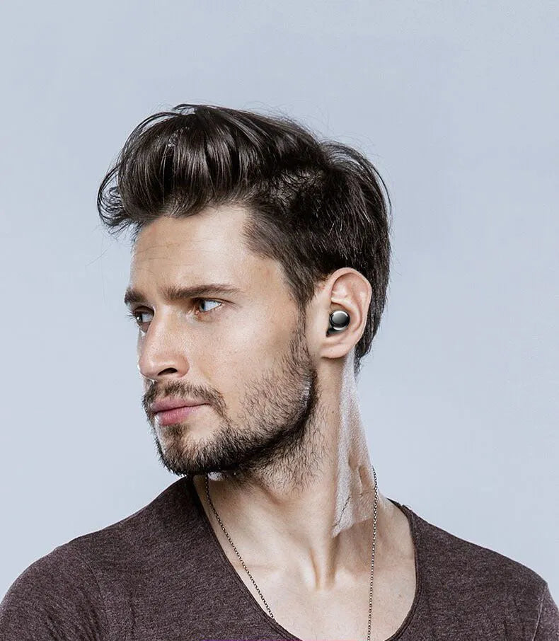 Wireless Bluetooth headset earbuds in black with battery display and stereo sound
