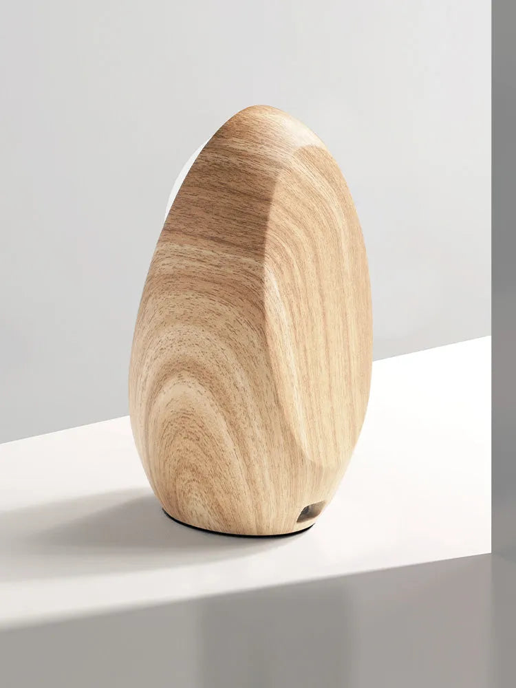 Creative Magsafe magnetic phone holder wireless charger in walnut resin colour on desk, 15.5cm length