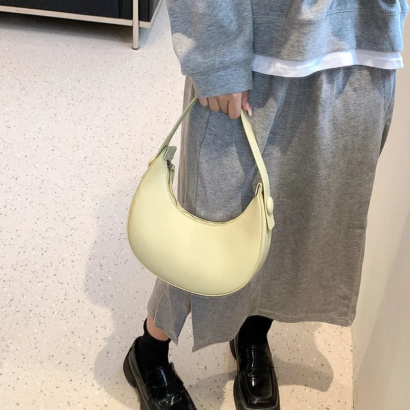 Retro dumpling-shaped women's shoulder bag in PU leather with sandwich pocket design