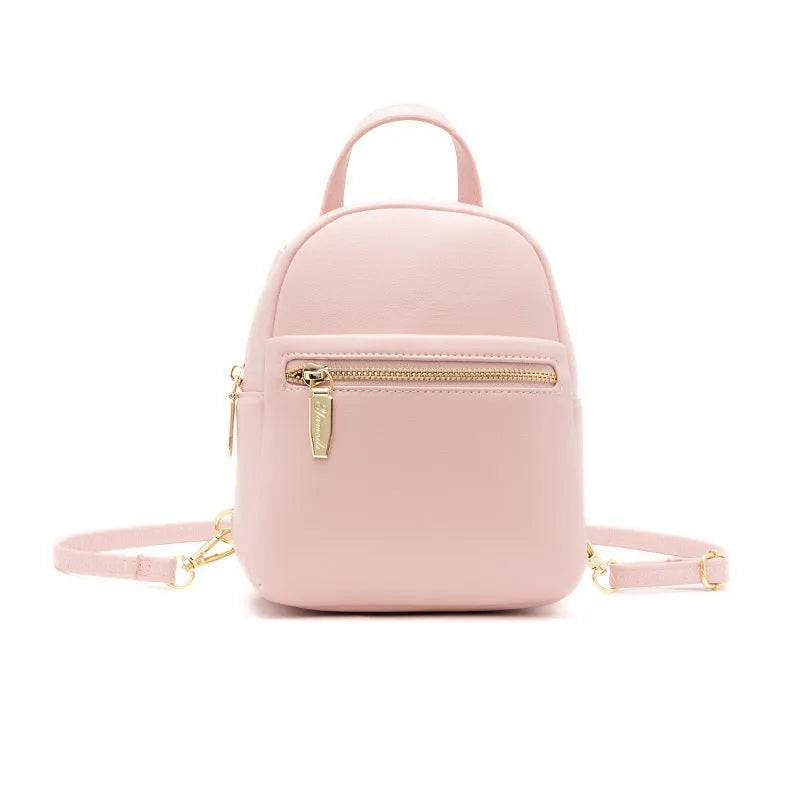 Soft PU mini backpack in street style with a three-dimensional front pocket, shown in multiple colour options.