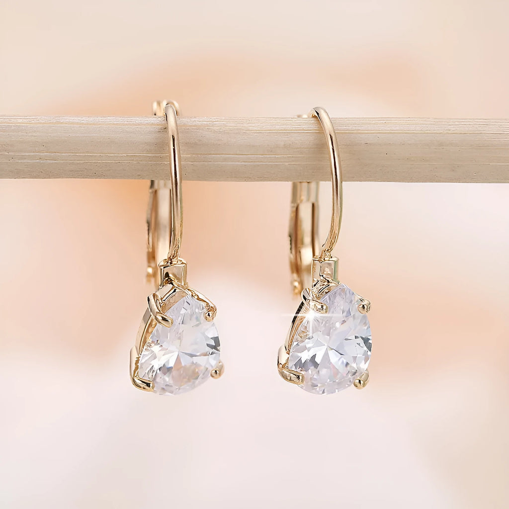 Women's drop-shaped copper earrings with gem inlay in gold and platinum colour options
