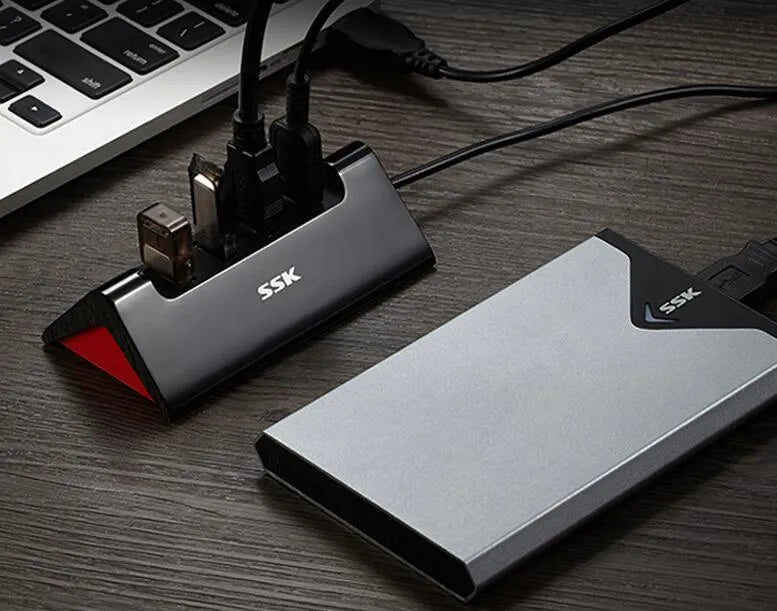 Black USB expansion dock with four ports and Micro USB power interface
