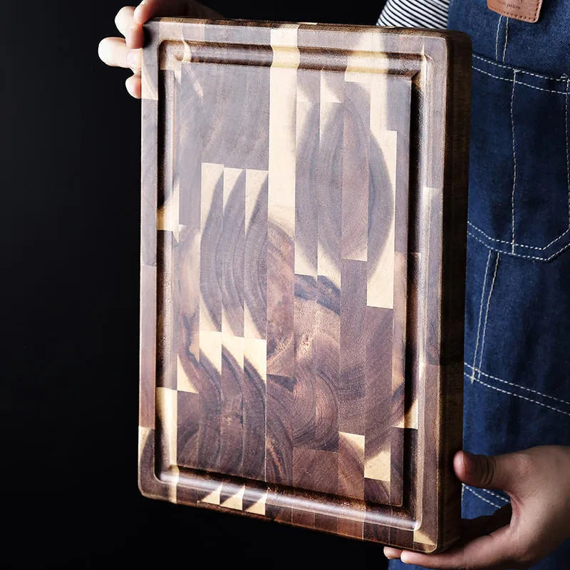 Brown acacia solid wood chopping board with parquet design, 3cm thick, on a kitchen counter