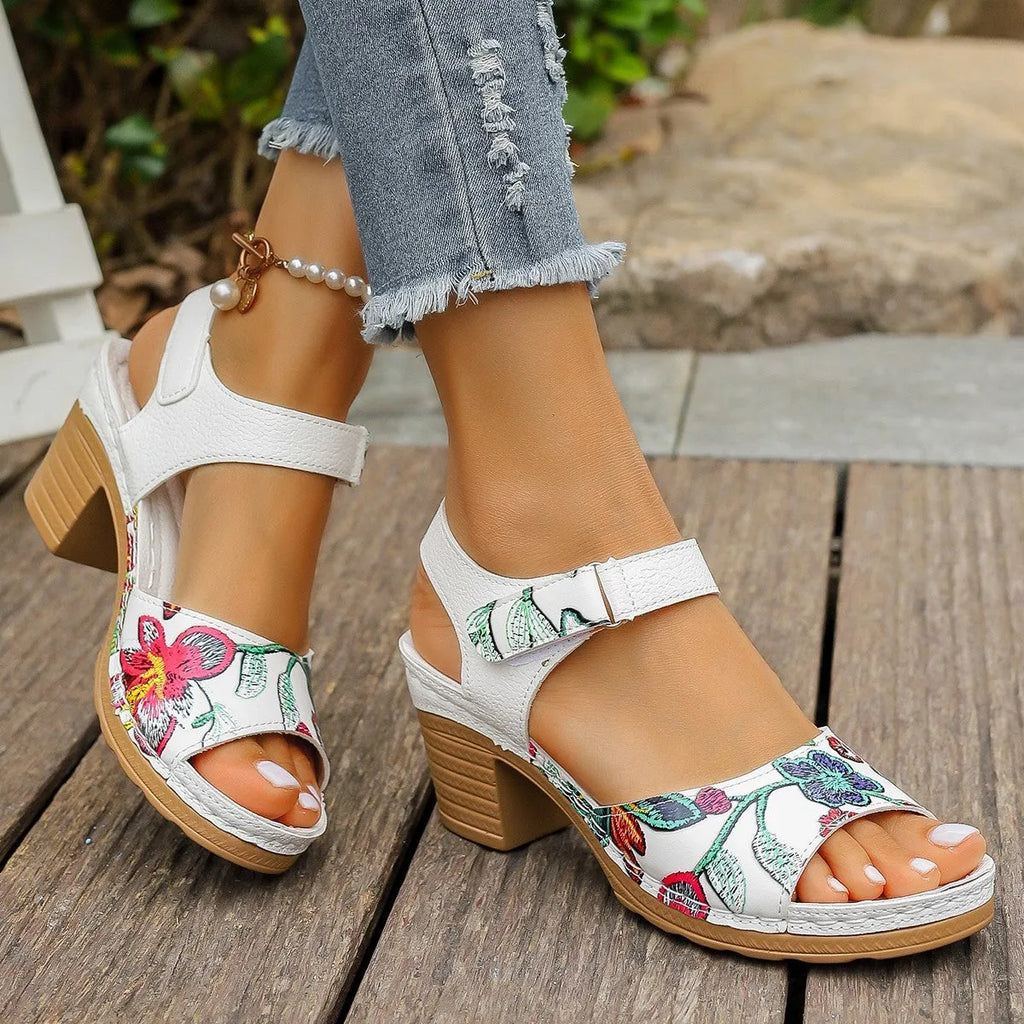 White women's high heel sandals with Velcro buckle fastening and rubber sole