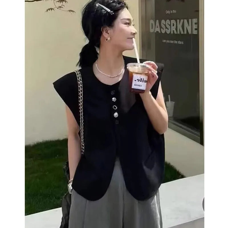Women's milky white loose-fit polyester vest with pockets, shown with a short 40cm length.