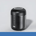 Black portable Bluetooth speaker with compact 72mm x 99mm plastic cabinet design showing connectivity ports.