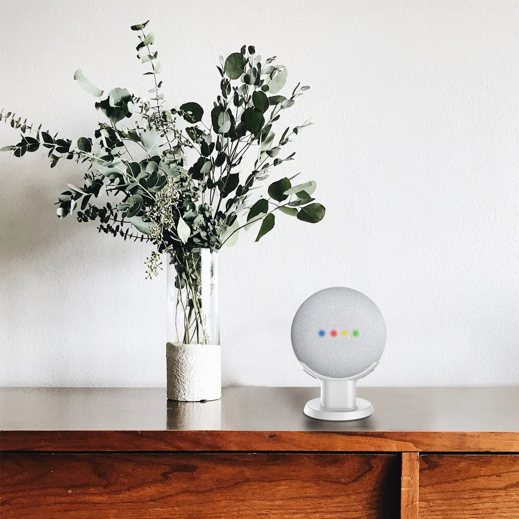 Plastic table holder for Google Home Mini voice assistant stand in black finish on a desk