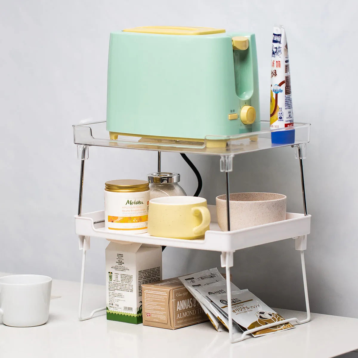 Plastic kitchen supplies rack organiser shelf in transparent and white options for countertop utensil storage