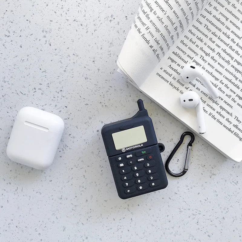 Green silicone protective case for AirPods 1 and 2 with a cartoon animal design on the front.
