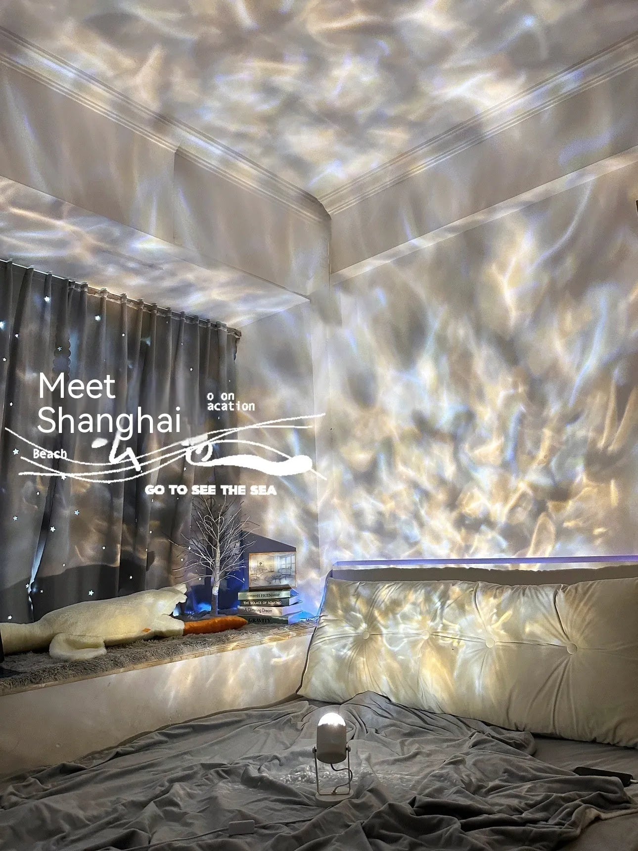 Dynamic water ripple ambience table lamp for ceiling or desktop use with metal holder.