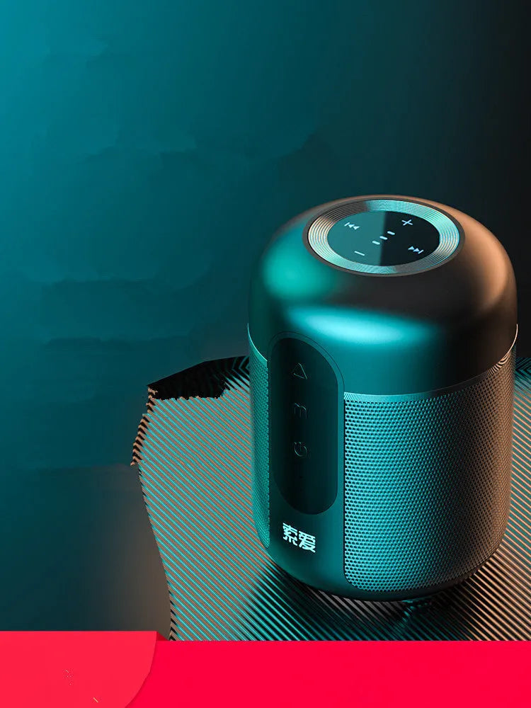 Black portable Bluetooth speaker with compact 72mm x 99mm plastic cabinet design showing connectivity ports.