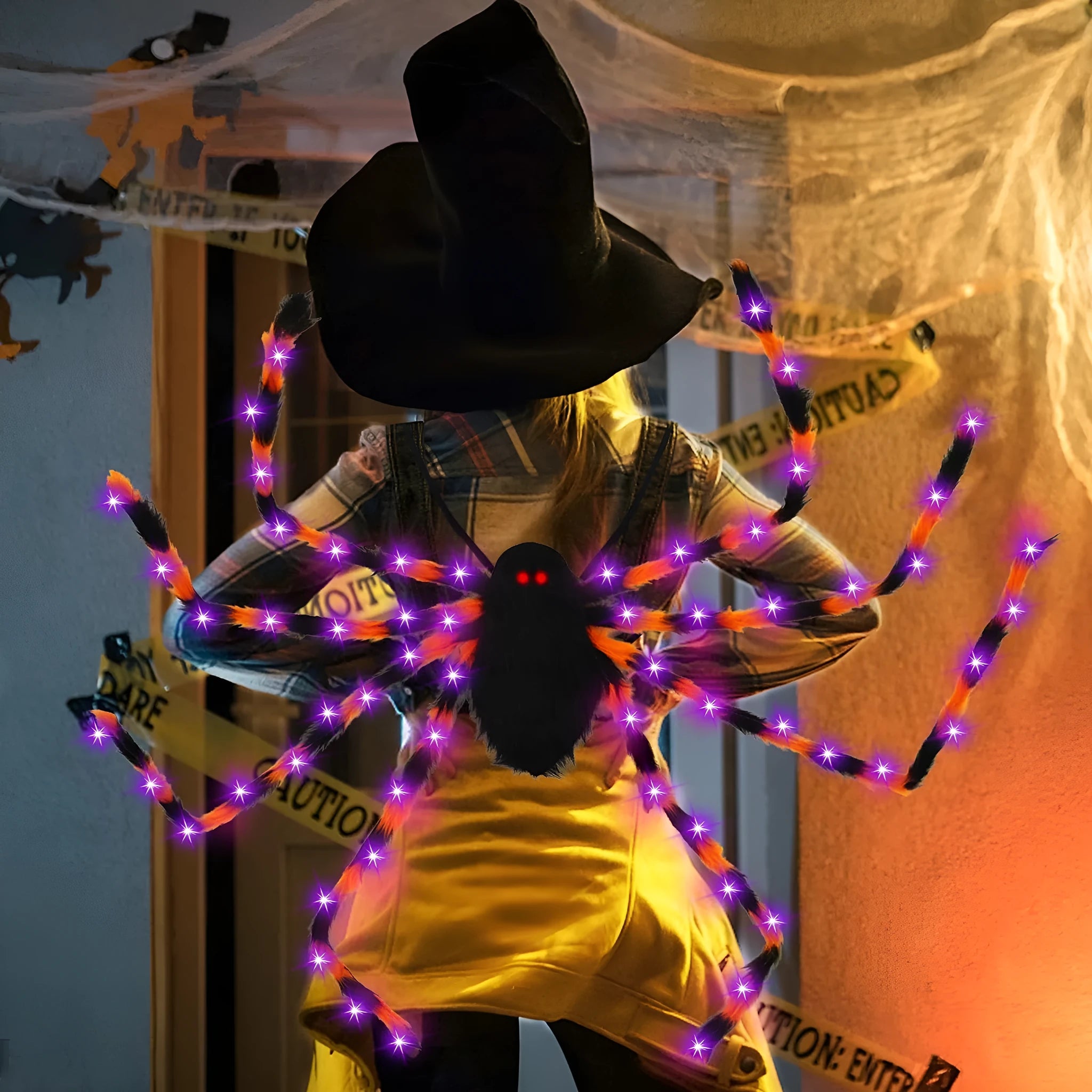 Halloween spider backpack with LED lights in plush construction showing orange purple light colour variant