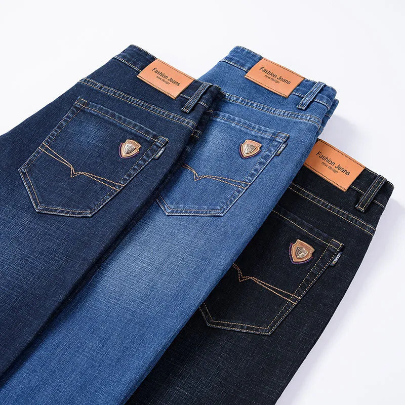 Men's straight loose elastic denim business trousers in dark blue colour, mid-waist straight-leg style on white background