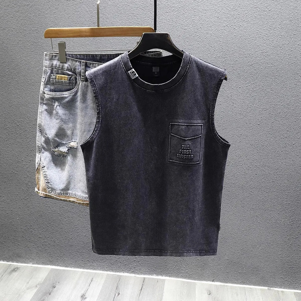 A solid colour loose cotton sleeveless t-shirt on a hanger, shown in white and black.