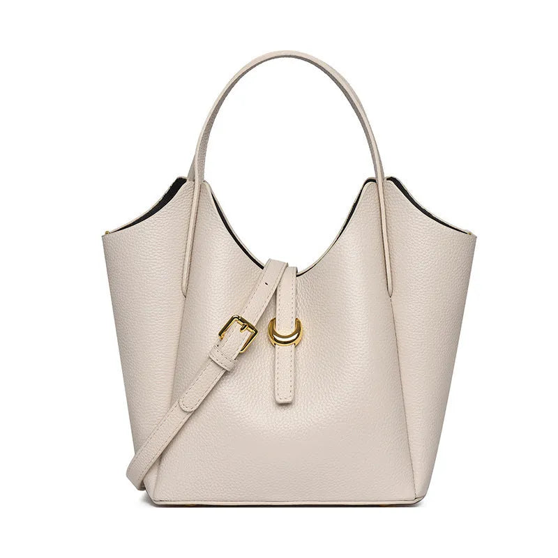 Genuine leather women's large capacity hand holding bucket bag in retro style.