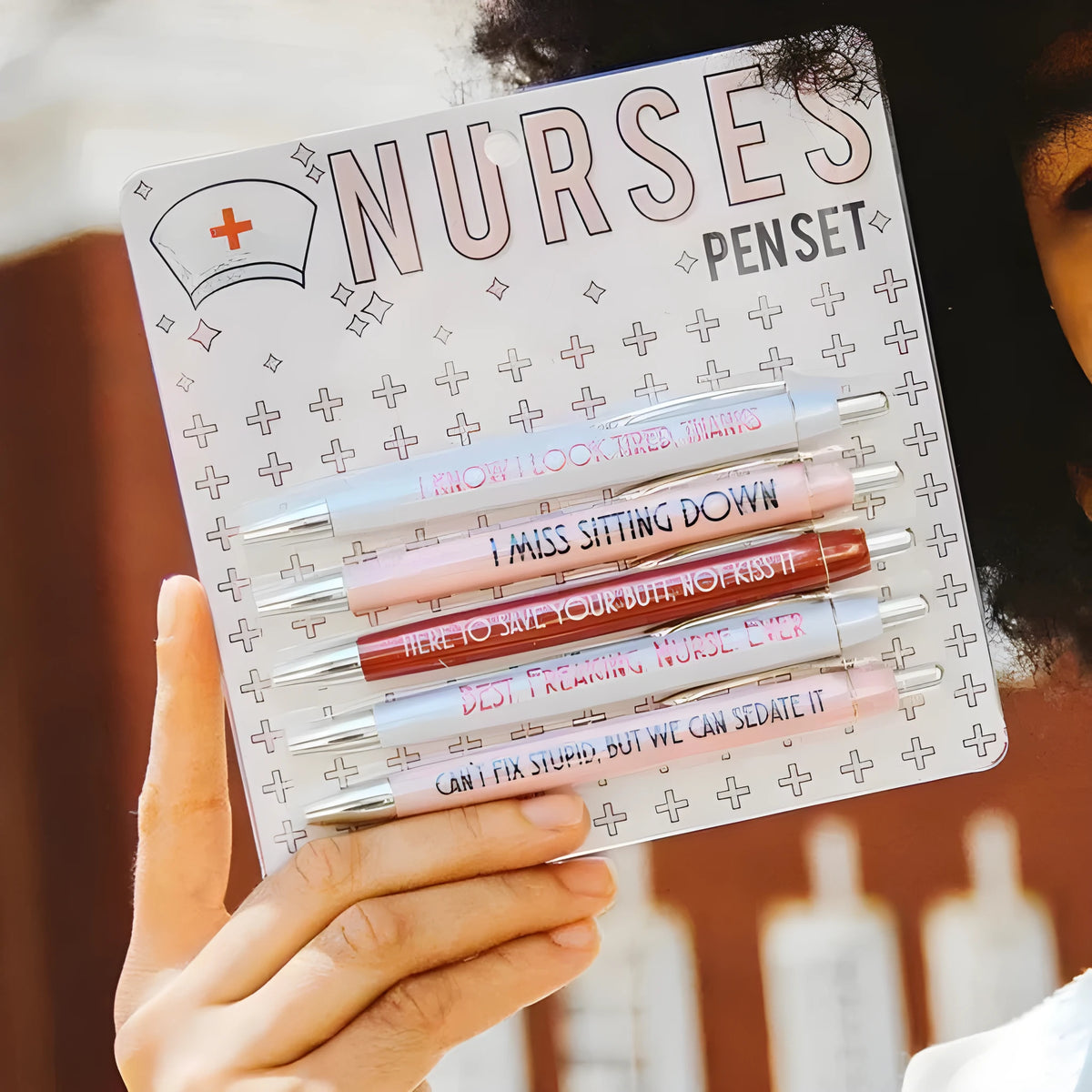 Five nurse-themed retractable ballpoint pens displayed together