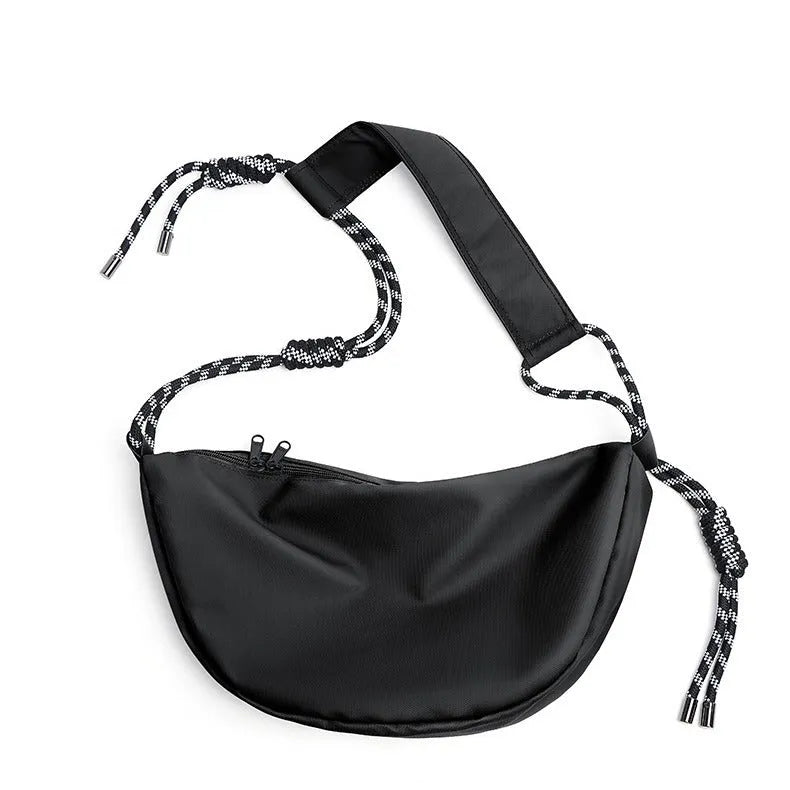 Men's large capacity nylon messenger bag in a solid colour for commuting.