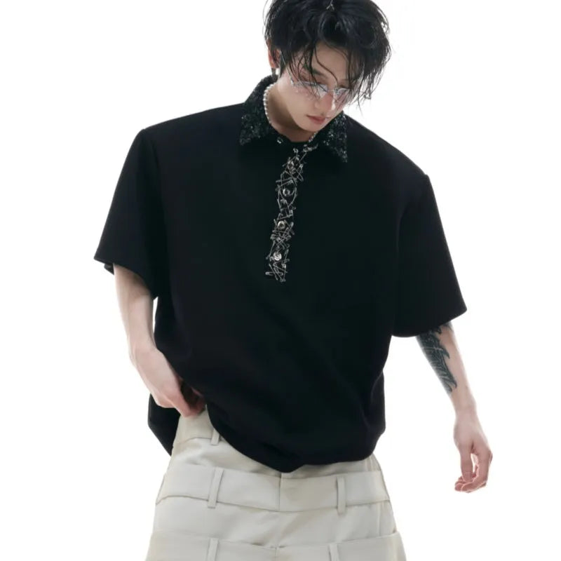 Men's black loose fit polo t-shirt with square collar and embroidered sequin detailing on short sleeves