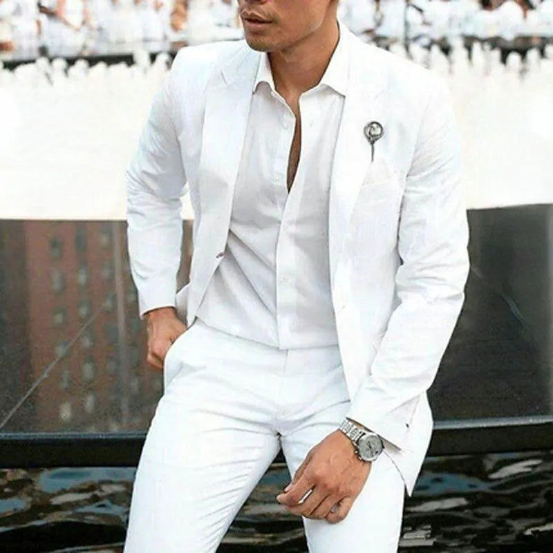 White slim fit two-piece men's suit jacket and trousers for weddings.