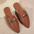 Light brown women's pointed-toe low heel semi-slippers with a rubber sole.