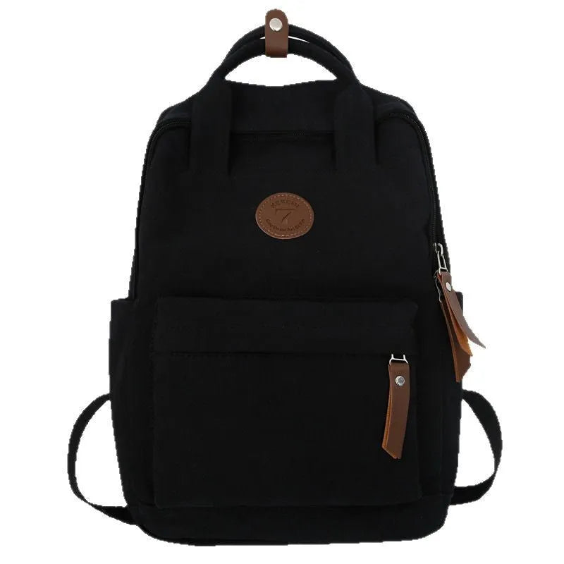 Black Oxford cloth leisure backpack with curved shoulder straps and urban simplicity styling