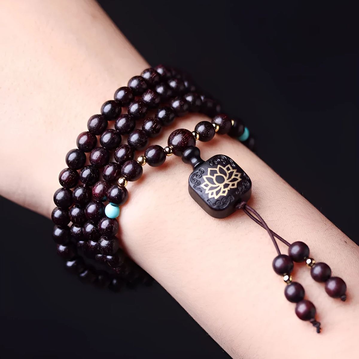Zambia rosewood Buddha beads bracelet with flat lotus pendant showing 108 wooden beads