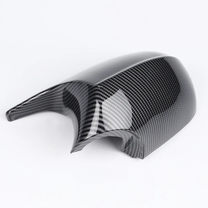 Pair of black ABS plastic rearview mirror shells for BMW 3 Series E90 door mirrors.