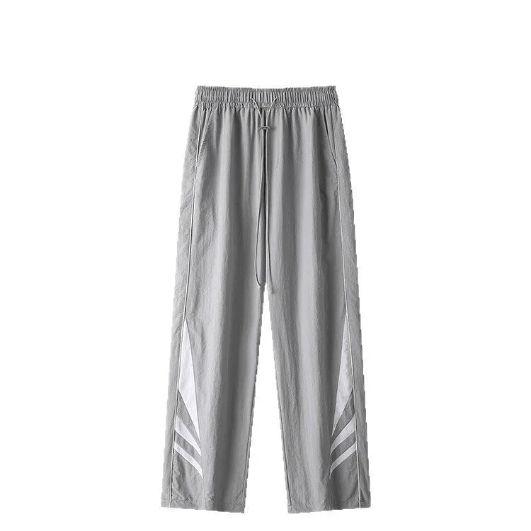 Men's straight-leg cotton blend trousers in black with buttoned cardigan front and non-ironing finish