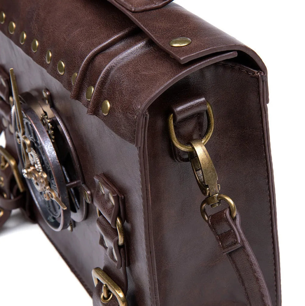 Bronze steampunk pillow shoulder bag with metal hardware on a structured square PU body.