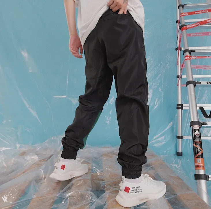 Japanese hip hop trousers with colour stitching, printed letters and bouquet foot in green or white