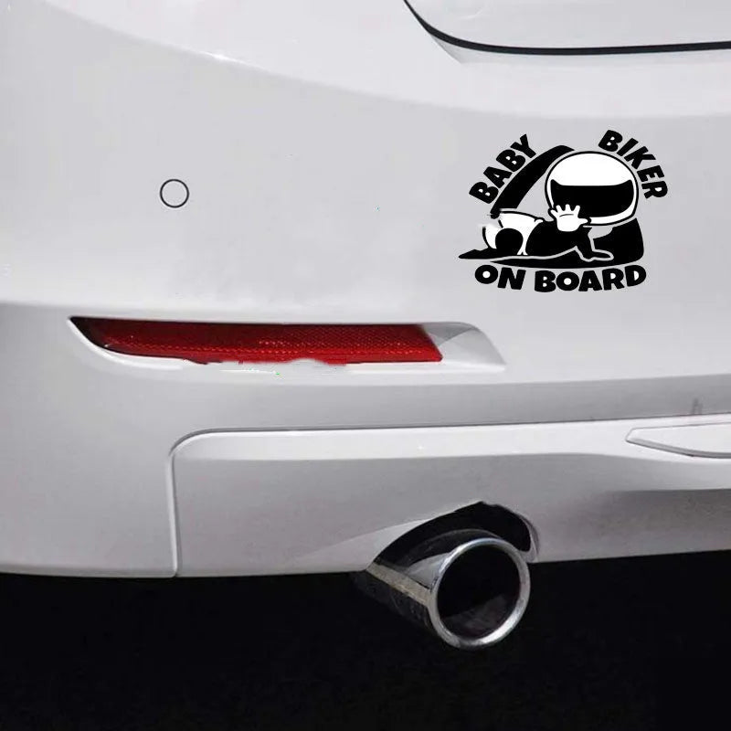 Black and white versions of a reflective BABY ON BOARD car sticker measuring 14.5 by 15 cm.