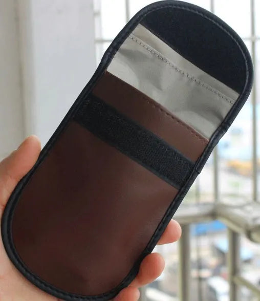 Black microfiber RFID shielding bag for car keys and cards measuring 13.5 by 9.5 cm