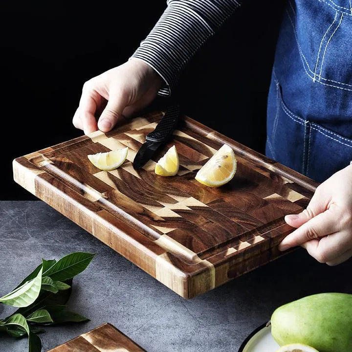 Brown acacia solid wood chopping board with parquet design, 3cm thick, on a kitchen counter