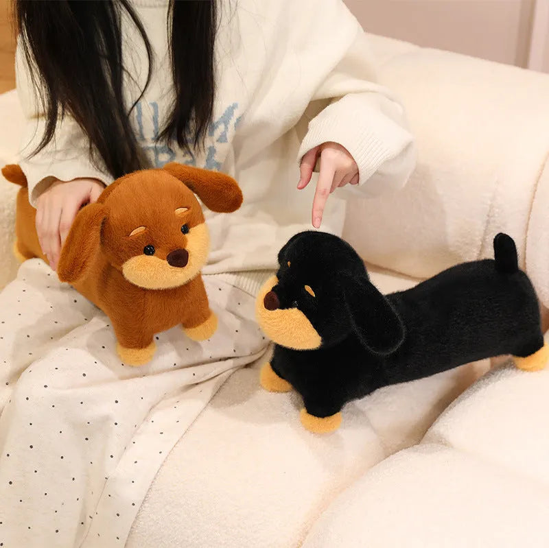 Cute plush sausage dog toy in brown European mink velvet on a light background