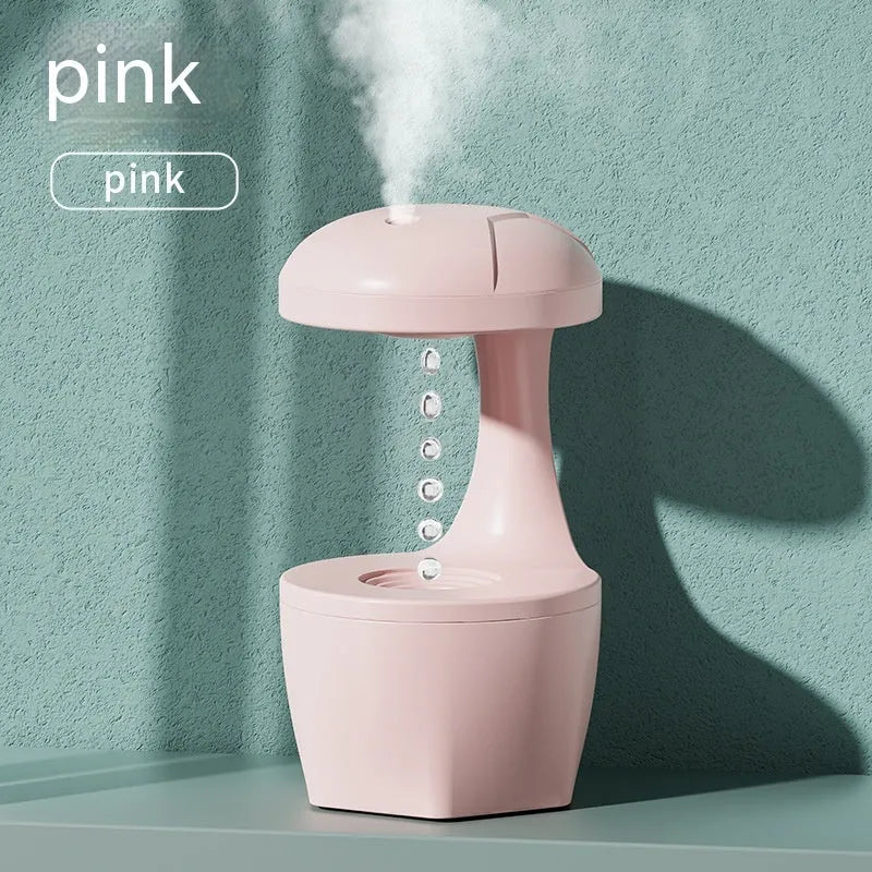Suspended anti-gravity ultrasonic humidifier in white column shape with USB cord and plastic body