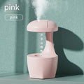 Suspended anti-gravity ultrasonic humidifier in white column shape with USB cord and plastic body