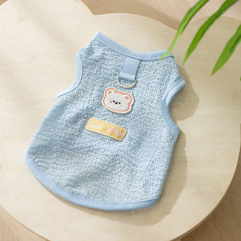 Colourful hollowed-out knitted cat clothing with a cartoon bear patch on the back