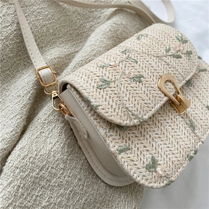 Straw woven satchel handbag with floral pattern in white colour option, single shoulder strap, summer beach bag