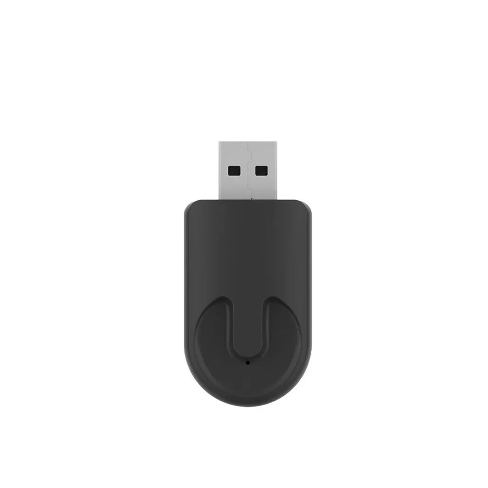 Black mini CarPlay USB interface adapter showing compact dimensions for vehicle installation