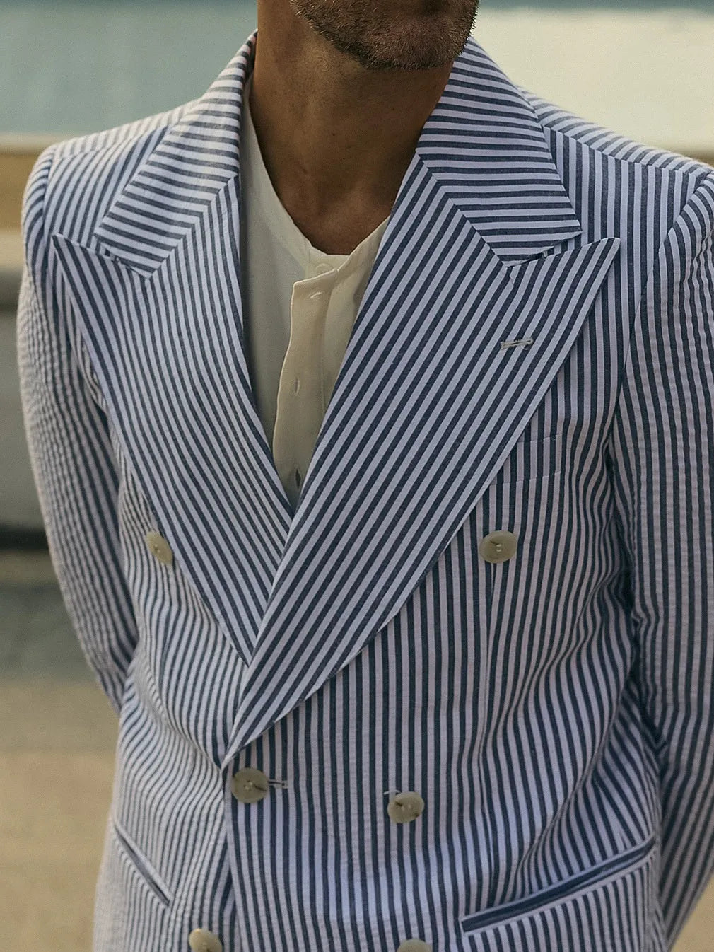 Blue and white striped women's polyester suit set with blazer and trousers
