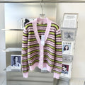 Pink Haima wool cardigan with nap finish and contrast colour detailing.