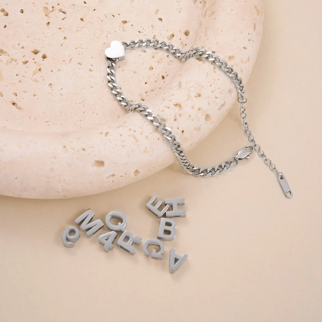 INS titanium steel necklace with letter, number, and heart pendant options on 40.5cm gold or silver chain