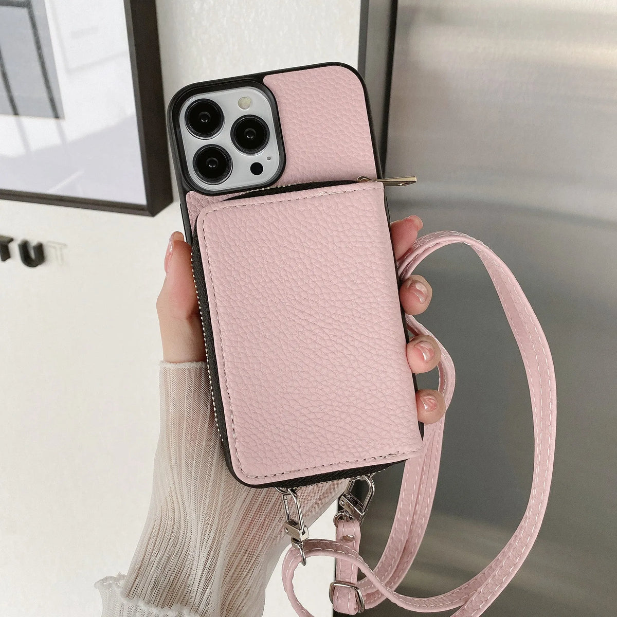 Litchi pattern textured protective case for iPhone on a table, shown in a selection of available colours.