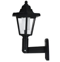 Black hexagonal solar wall lamp for outdoor garden lighting with automatic light sensor