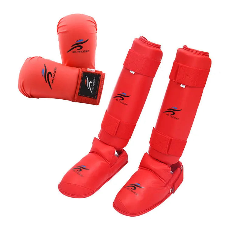 Martial arts protective gear set with red leg guards, helmet, and boxing gloves for karate training